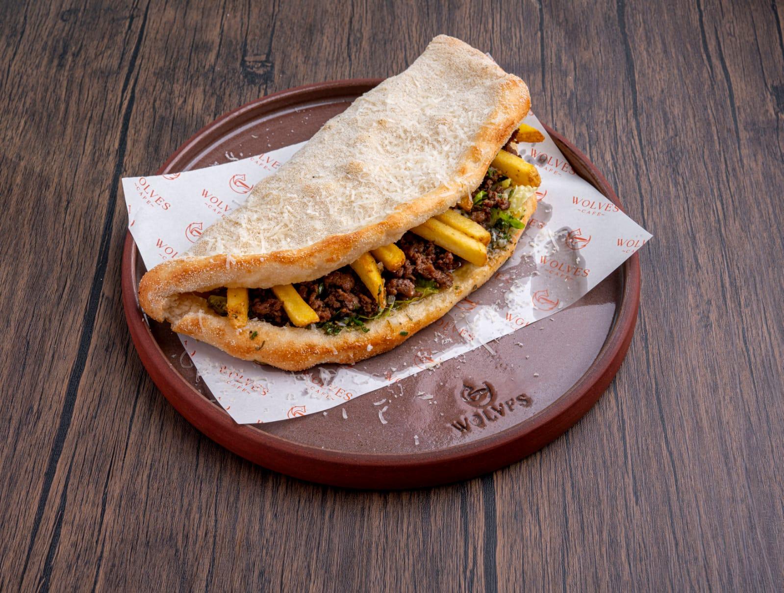 Hummus Bilahamh Folded Pizza