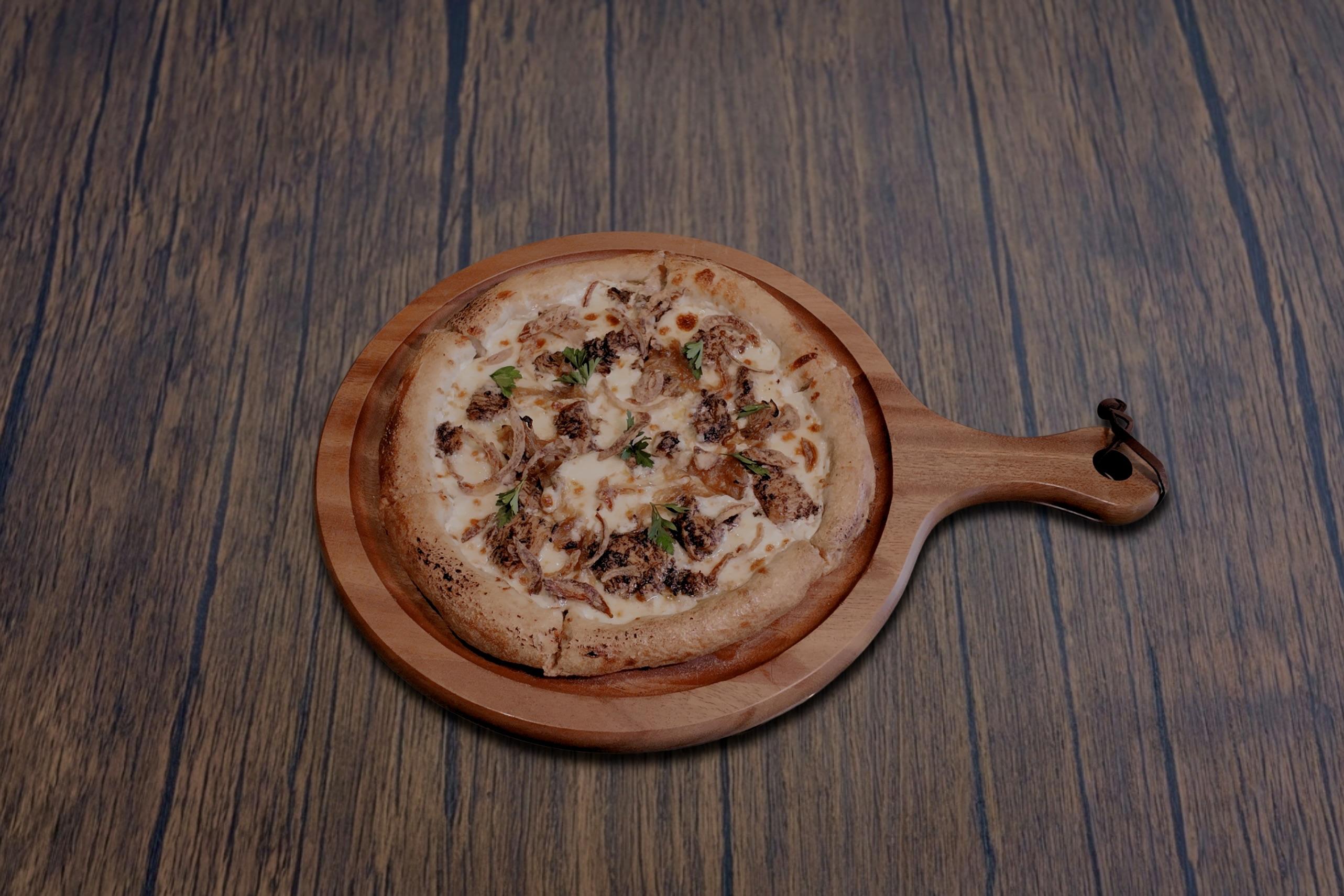 Mussakhan Chicken Pizza